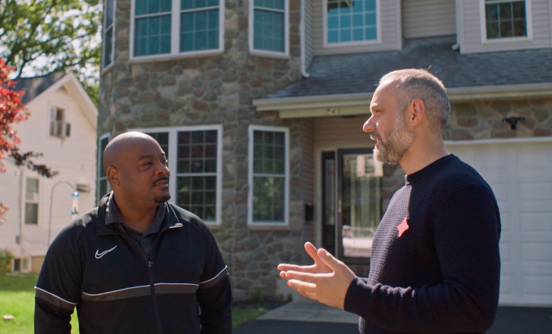 Wysh founder speaking with a homeowner