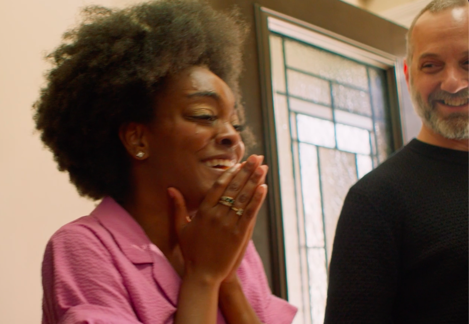 A woman reacting emotionally during a Wysh experience